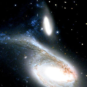 Проходження IC 4970 через NGC 6872